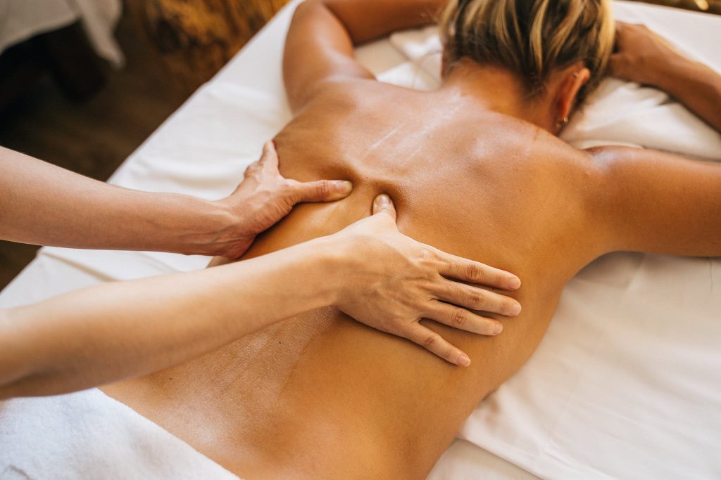 a-person-massaging-a-clients-bare-back-1024x683 (1)